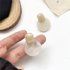 Premium brown resin round earrings