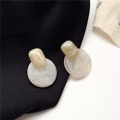 Premium brown resin round earrings