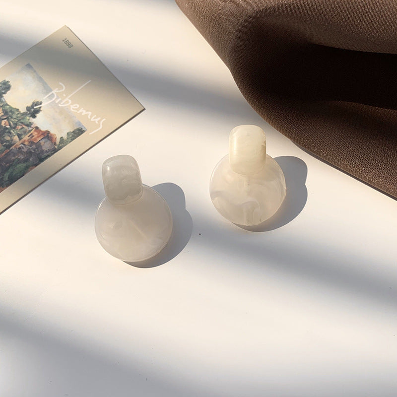 Premium brown resin round earrings